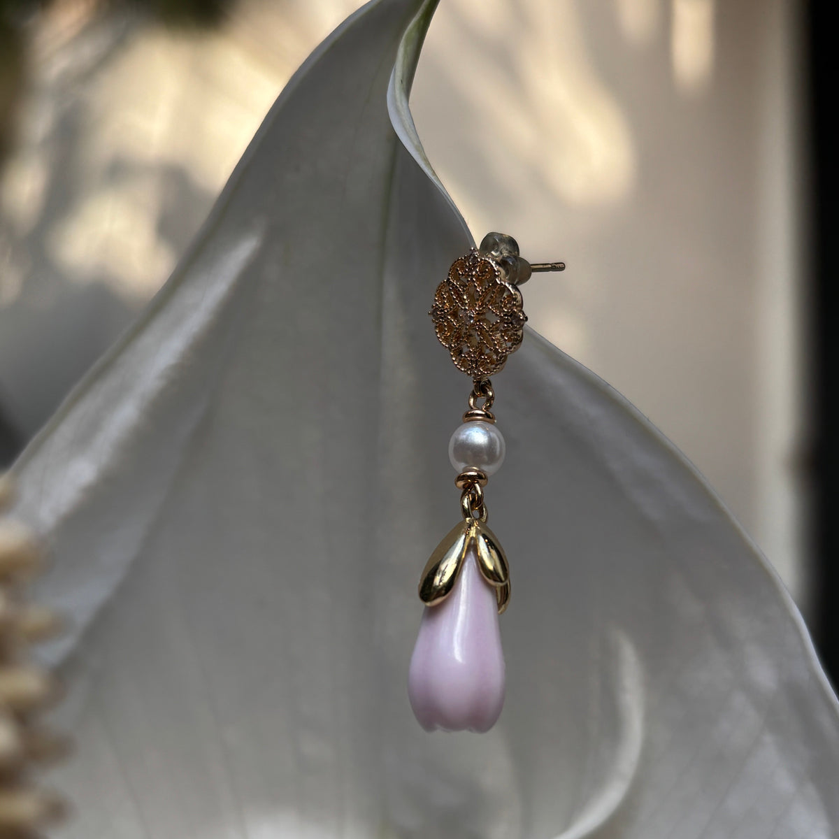 Handcrafted Ceramic Magnolia Bud Earrings with Emerald Accents